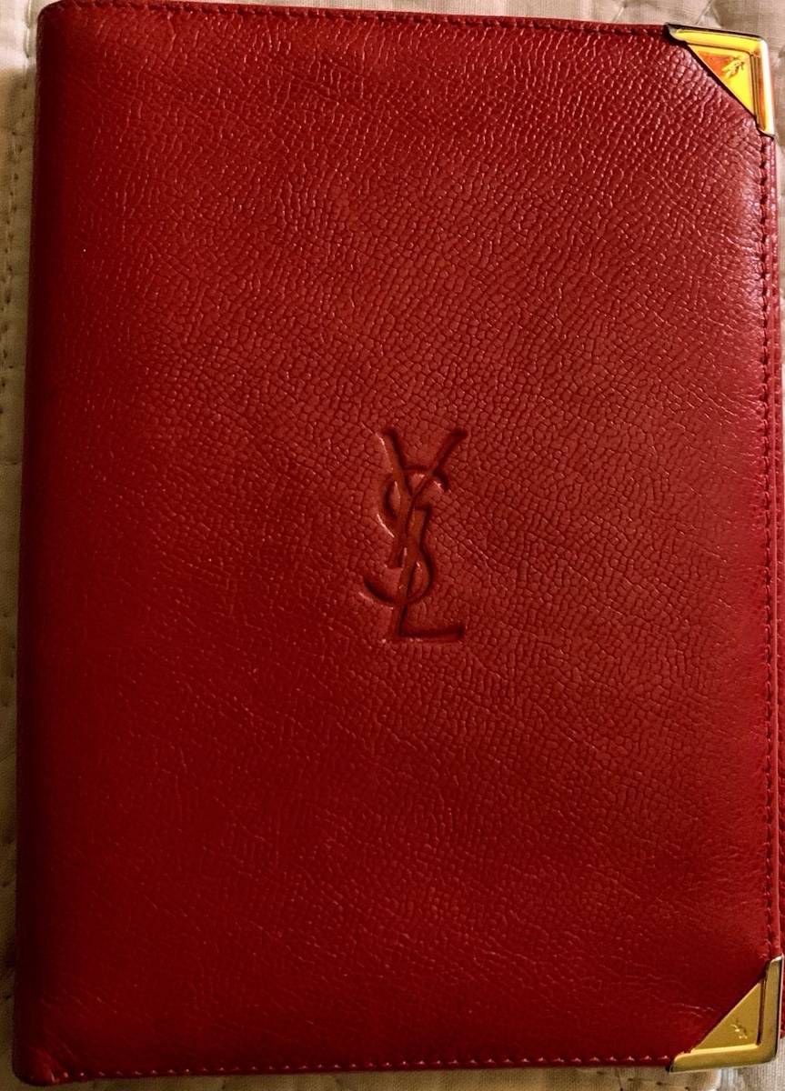 Vends porte-feuille Yves Saint Laurent cuir rouge