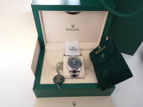 Rolex Oyster Perpetual Datejust 36 mm ref. 126234 acier, cadran bleu cannelé, bracelet Oyster / set complet