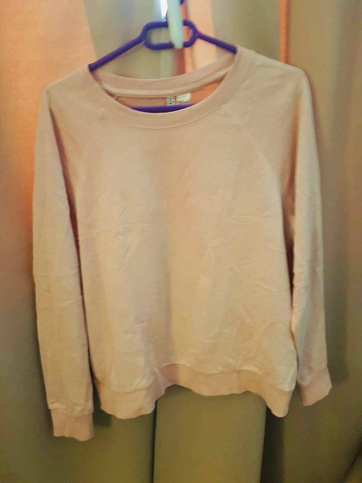 Vends sweat rose pâle Taille L