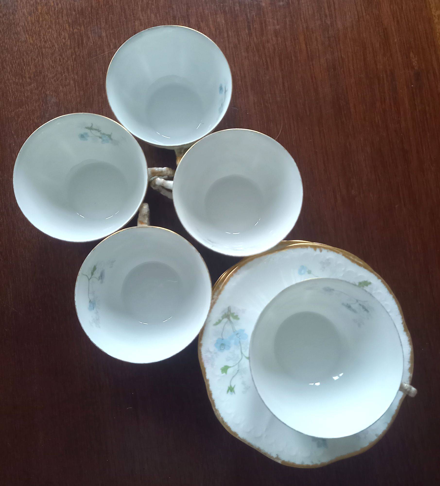 Cinq tasses à café porcelaine fine "Couturier"