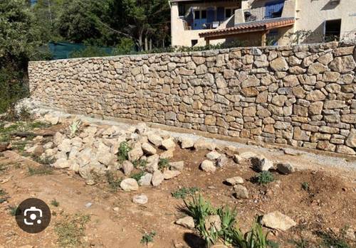 Propose Travaux de voûte et mur en pierres meulières