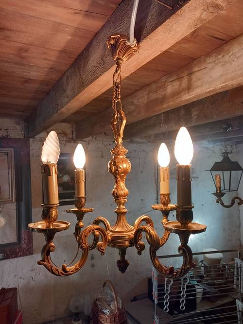 Vends lustre en bronze