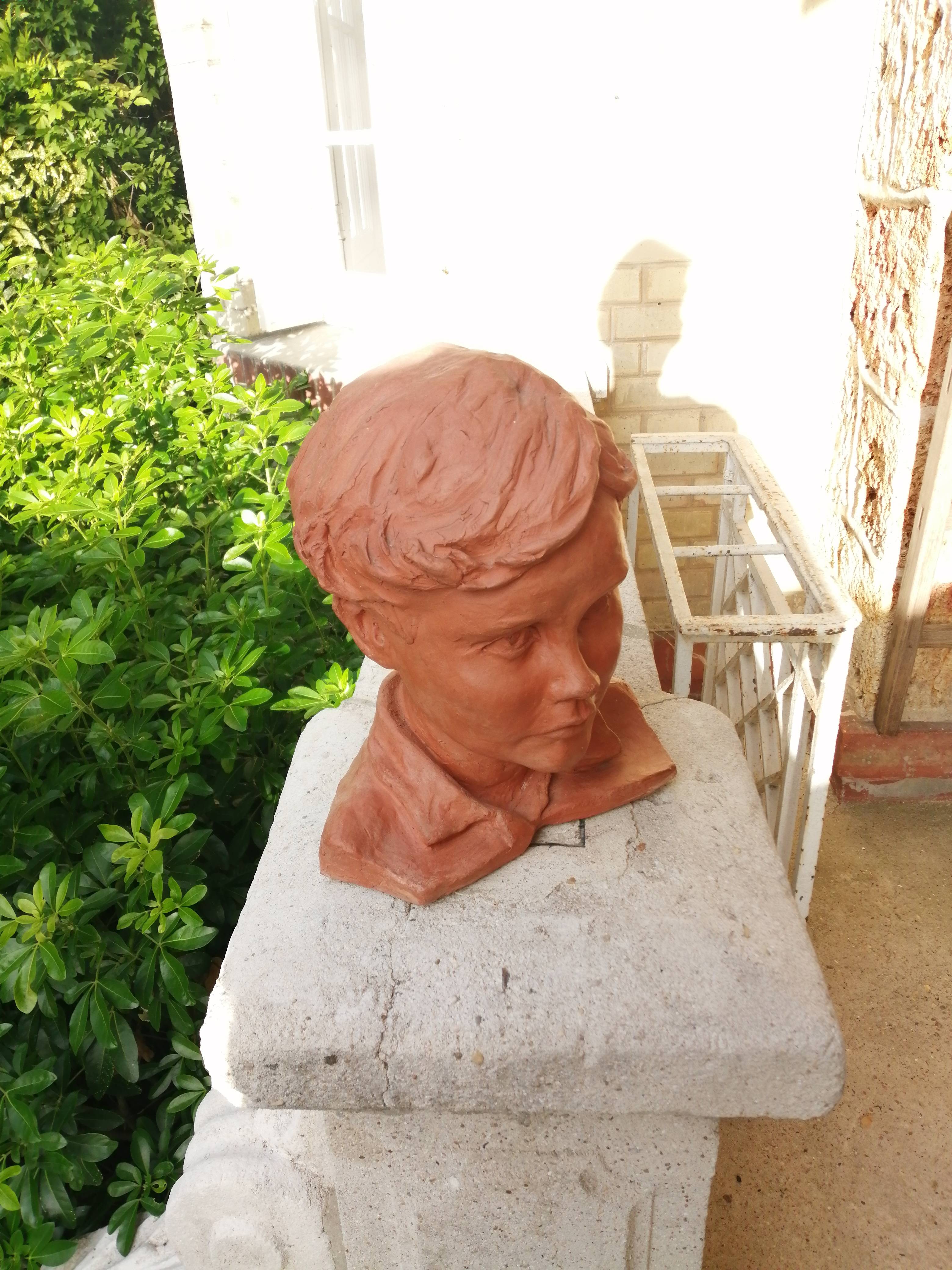 Vends buste enfant en terre cuite