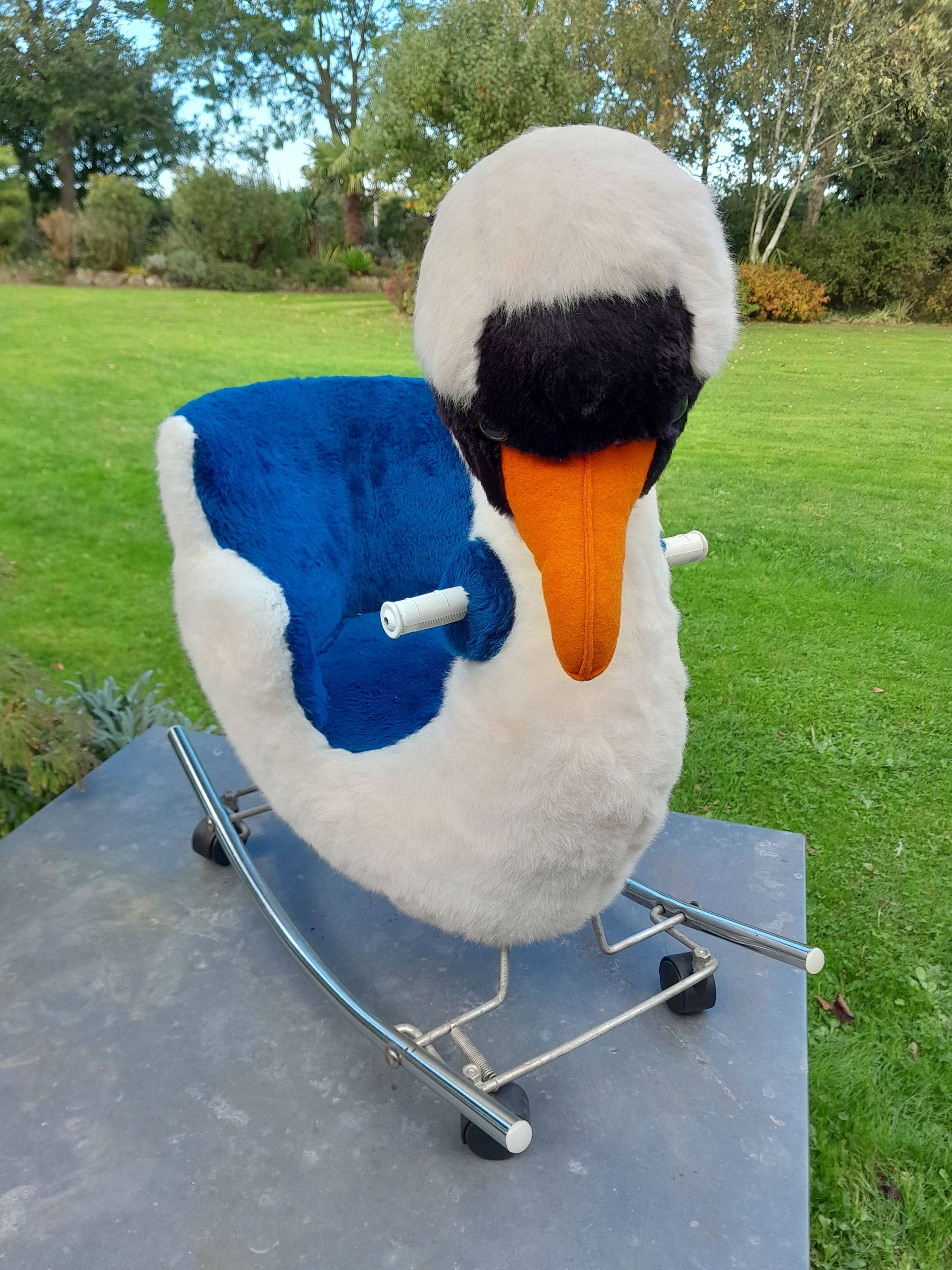 Vends cygne à bascule ou roulettes 2 positions, très bon état