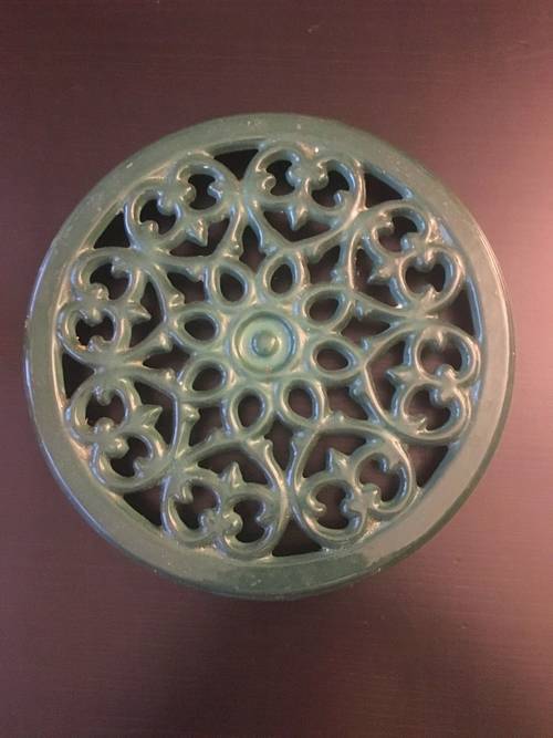 Vends dessous de plat en fonte émaillée vert