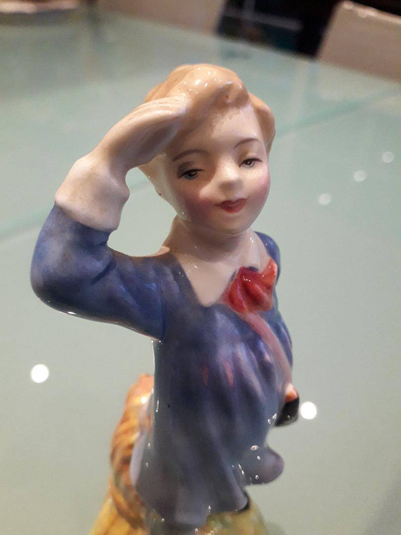 Vends une figurine de collection en porcelaine Royal Doulton