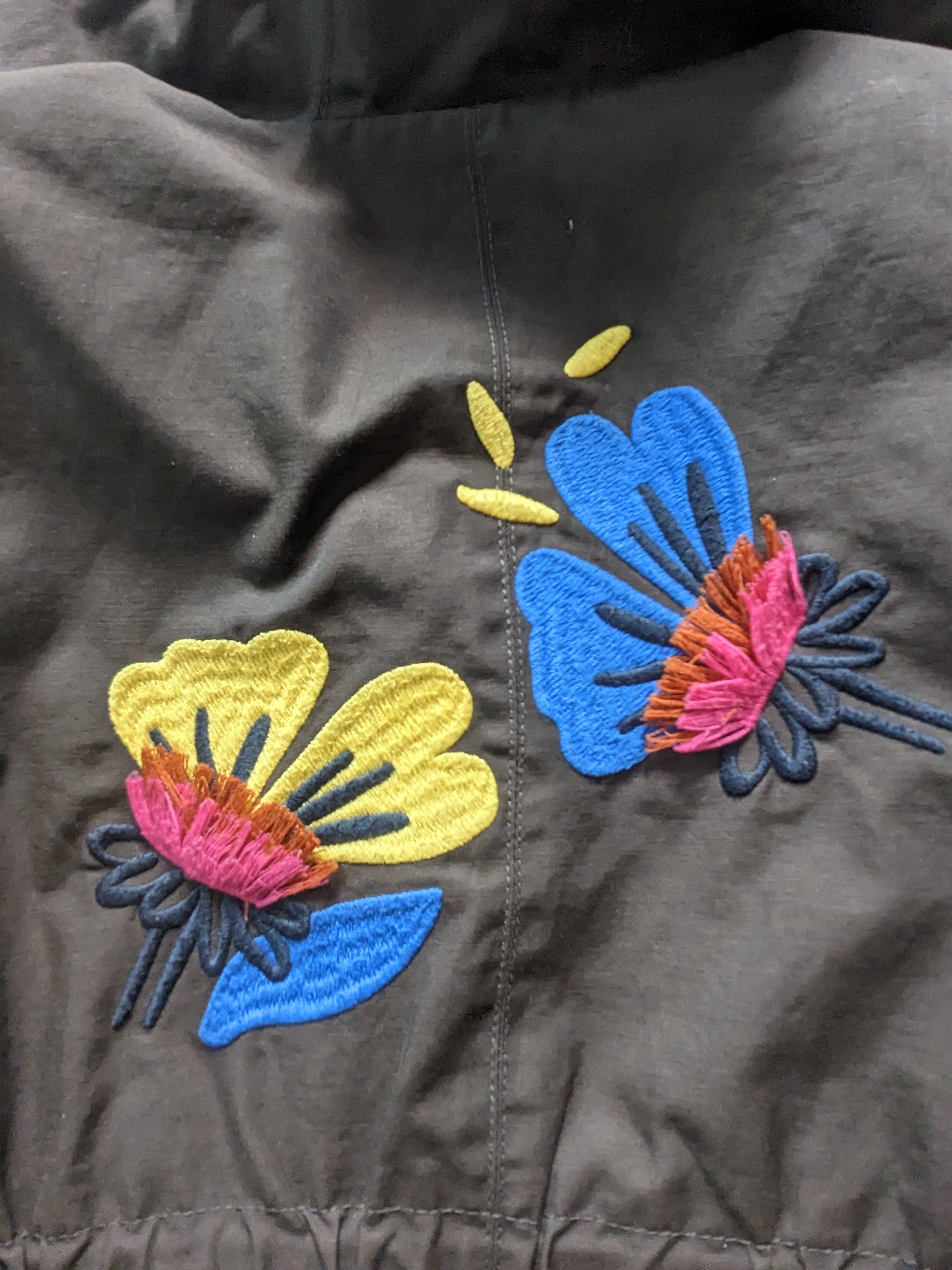 Vends imperméable Catimini 4 ans brodé