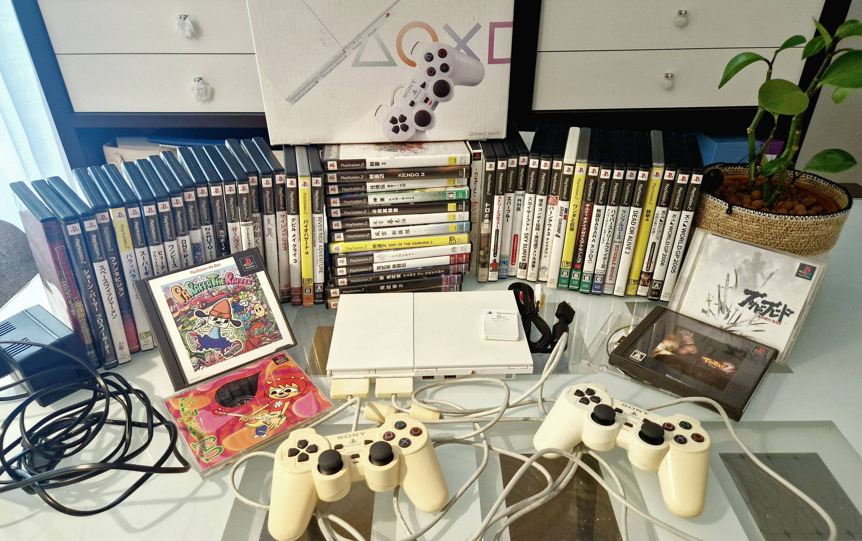 VENDS PS2 JAPONAISE SLIM 2007 AVEC 51 JEUX PS2 JAP ET 5 JEUX PS1 JAP