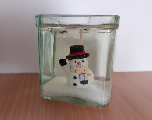 Vends jolie bougie de Noël dans son support en verre