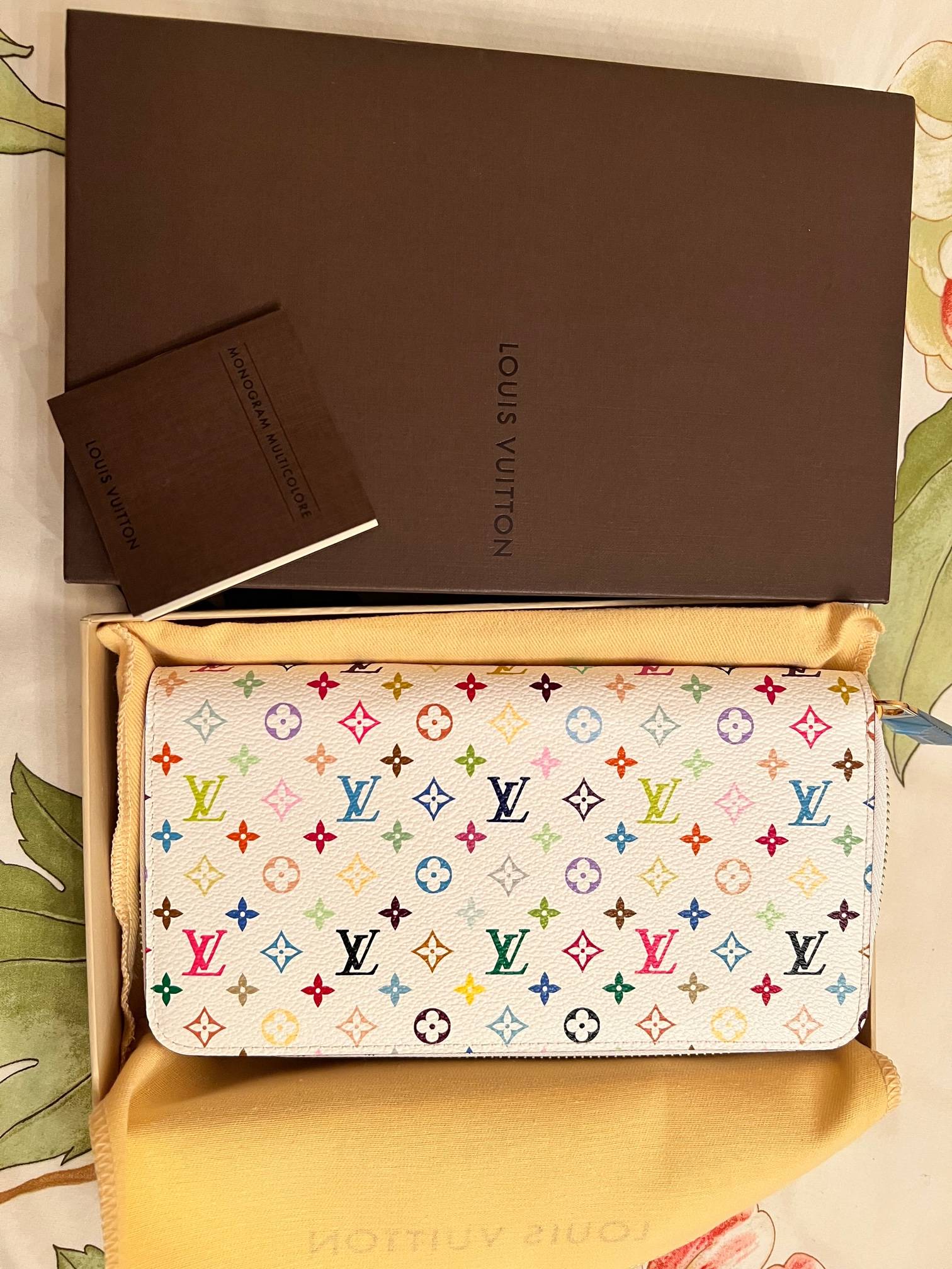 Vends Portefeuille femme Zippy Louis Vuitton blanc et couleurs, neuf, jamais utilisé