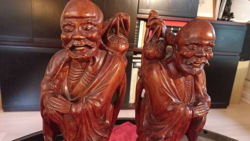 Vends paire de sujets en bois sculpté, Indochine vers 1920