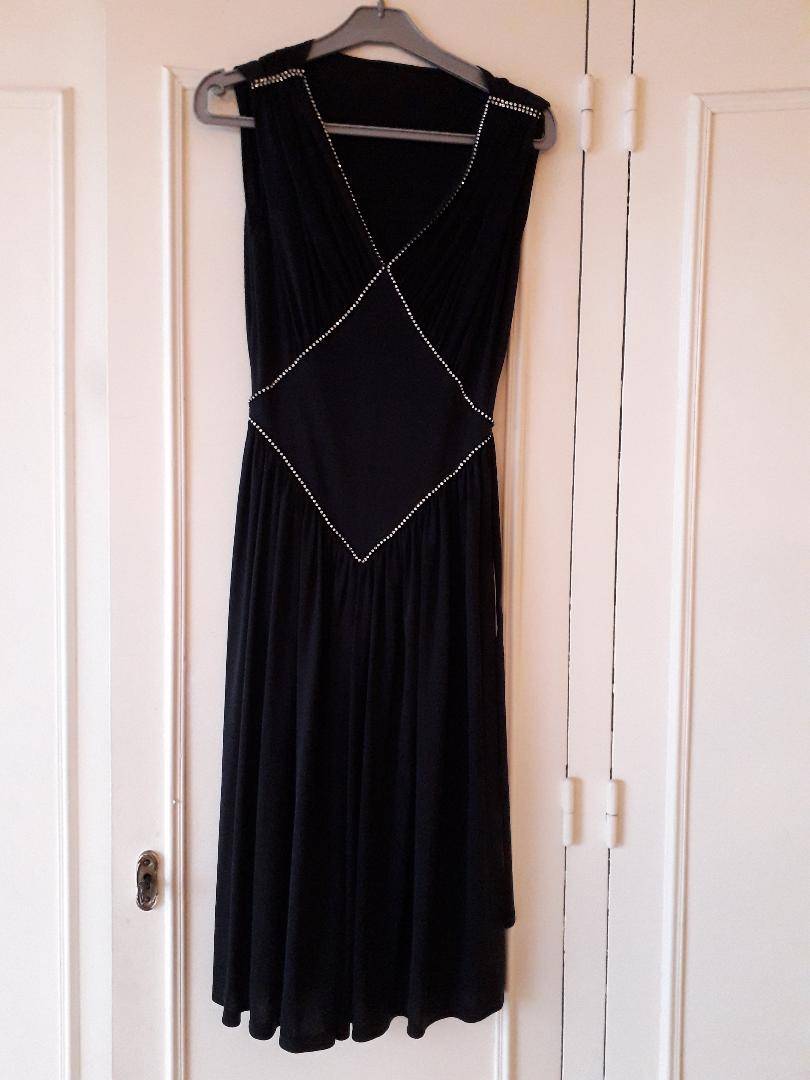 Vends petite robe noire à strass