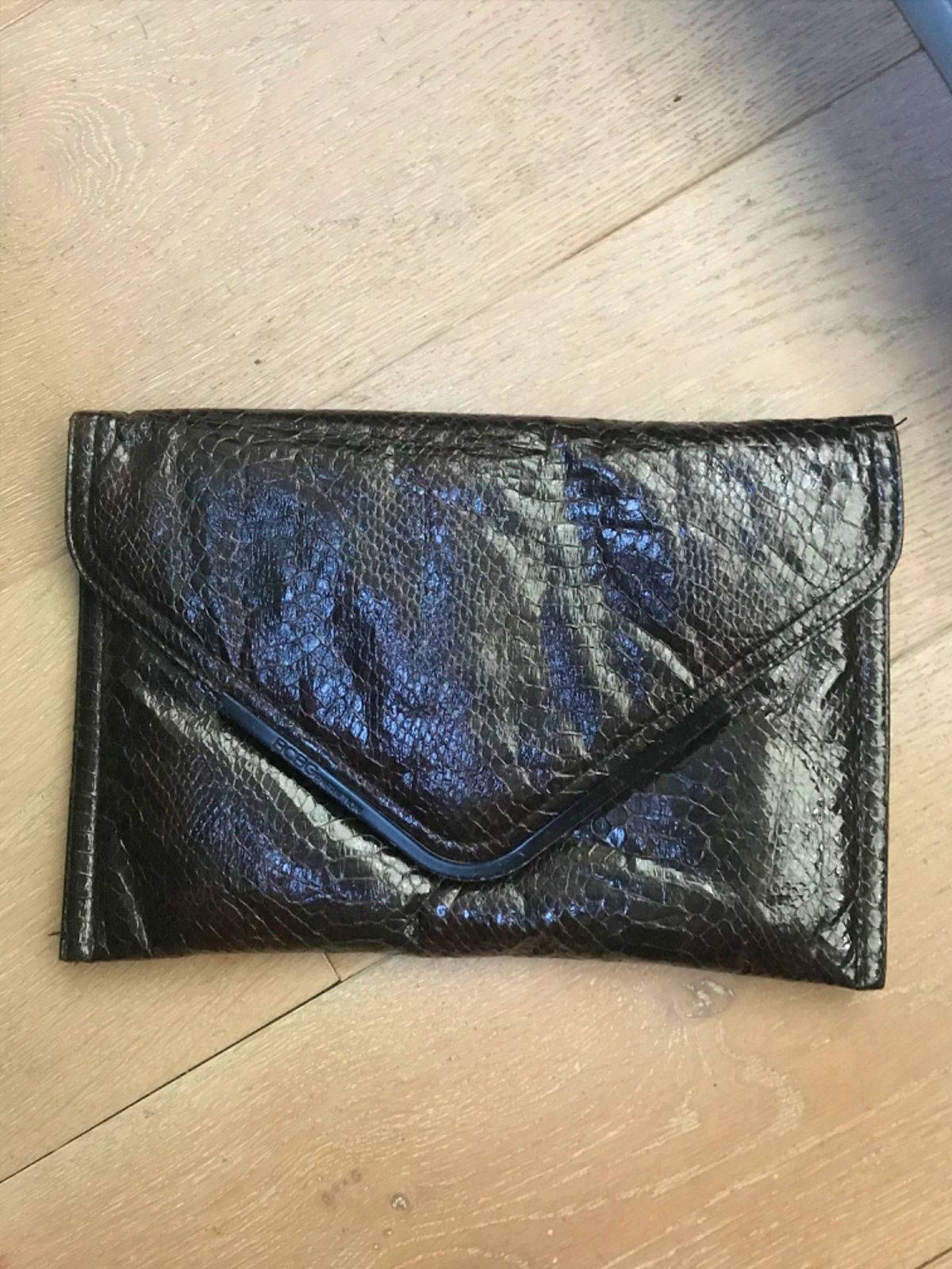 Vends pochette main simili cuir BCBGeneration