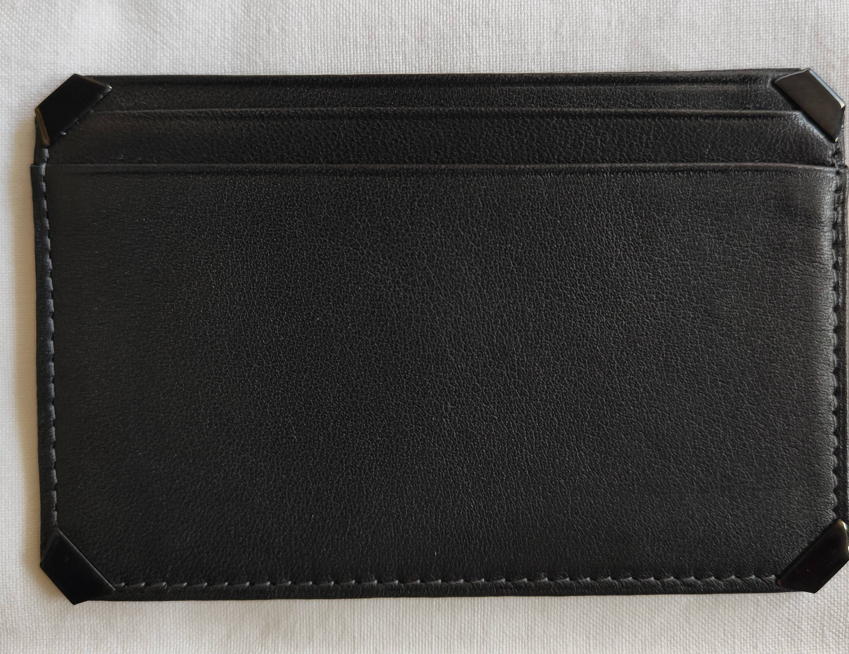 Je vends un porte-cartes en cuir lisse, noir, Le Tanneur, 4 compartiments cartes, neuf