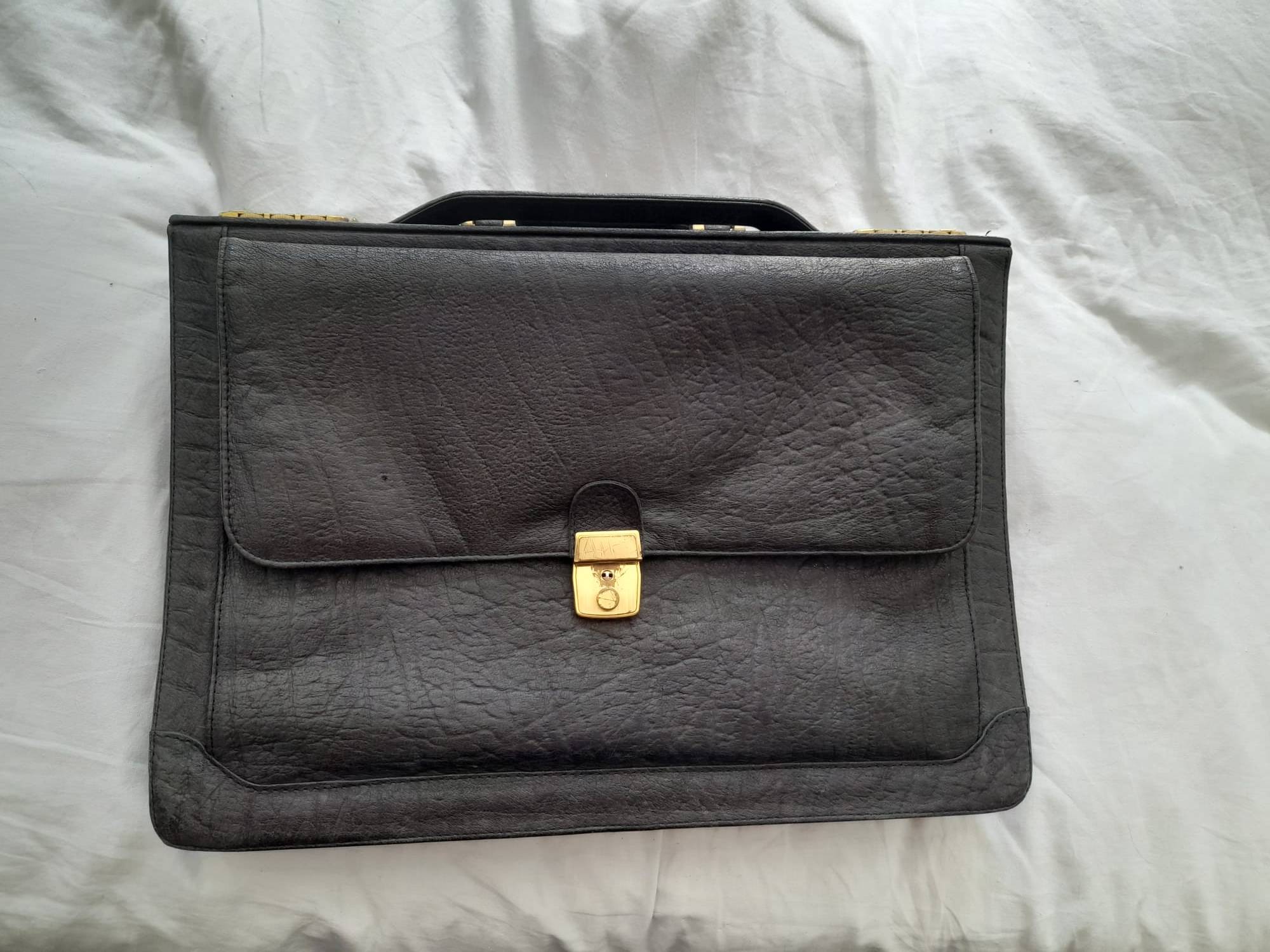 Vends porte-documents vintage en cuir de buffle