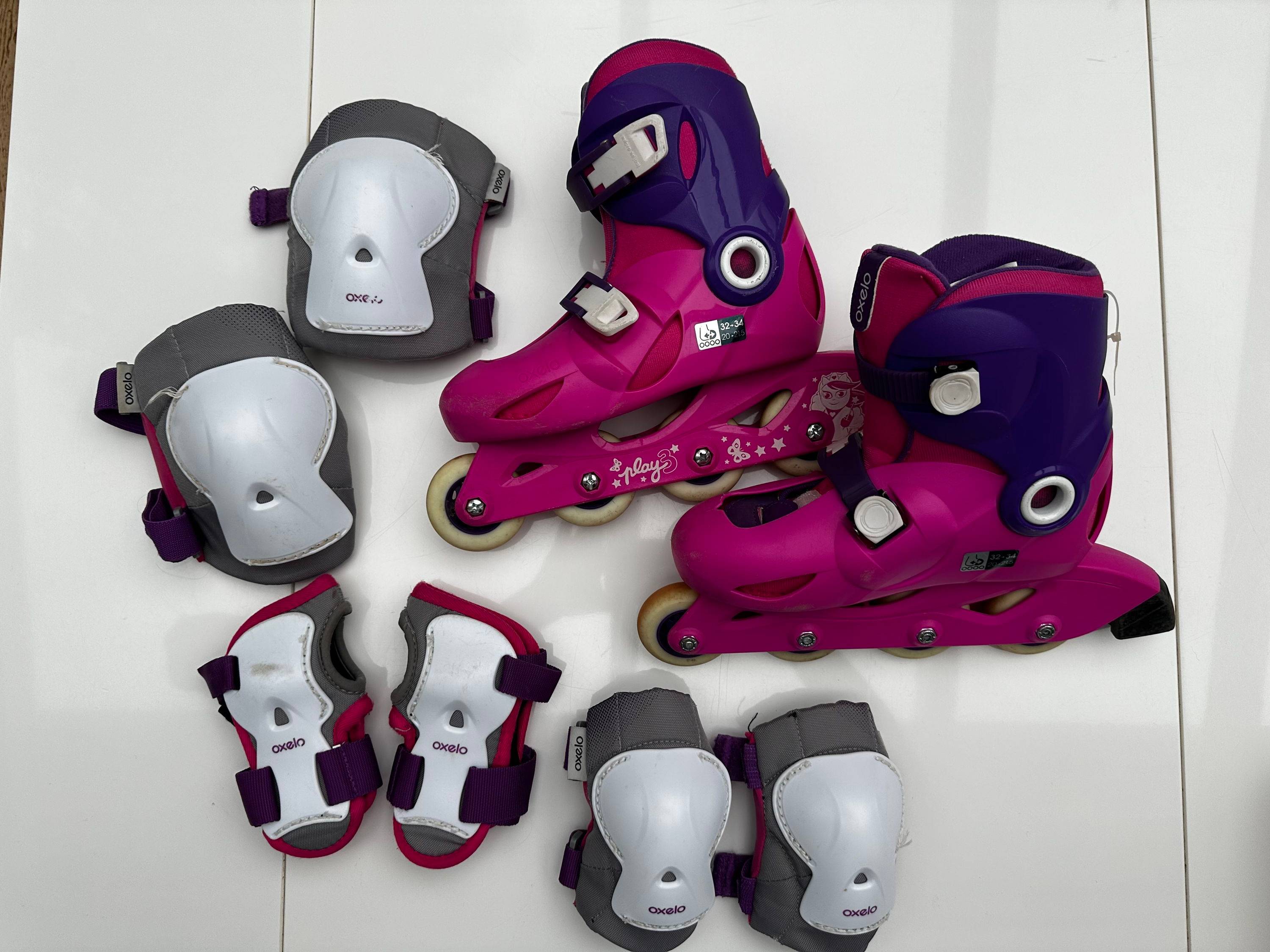 Vends rollers enfant Oxelo Play3 rose/violet + protections en bon état