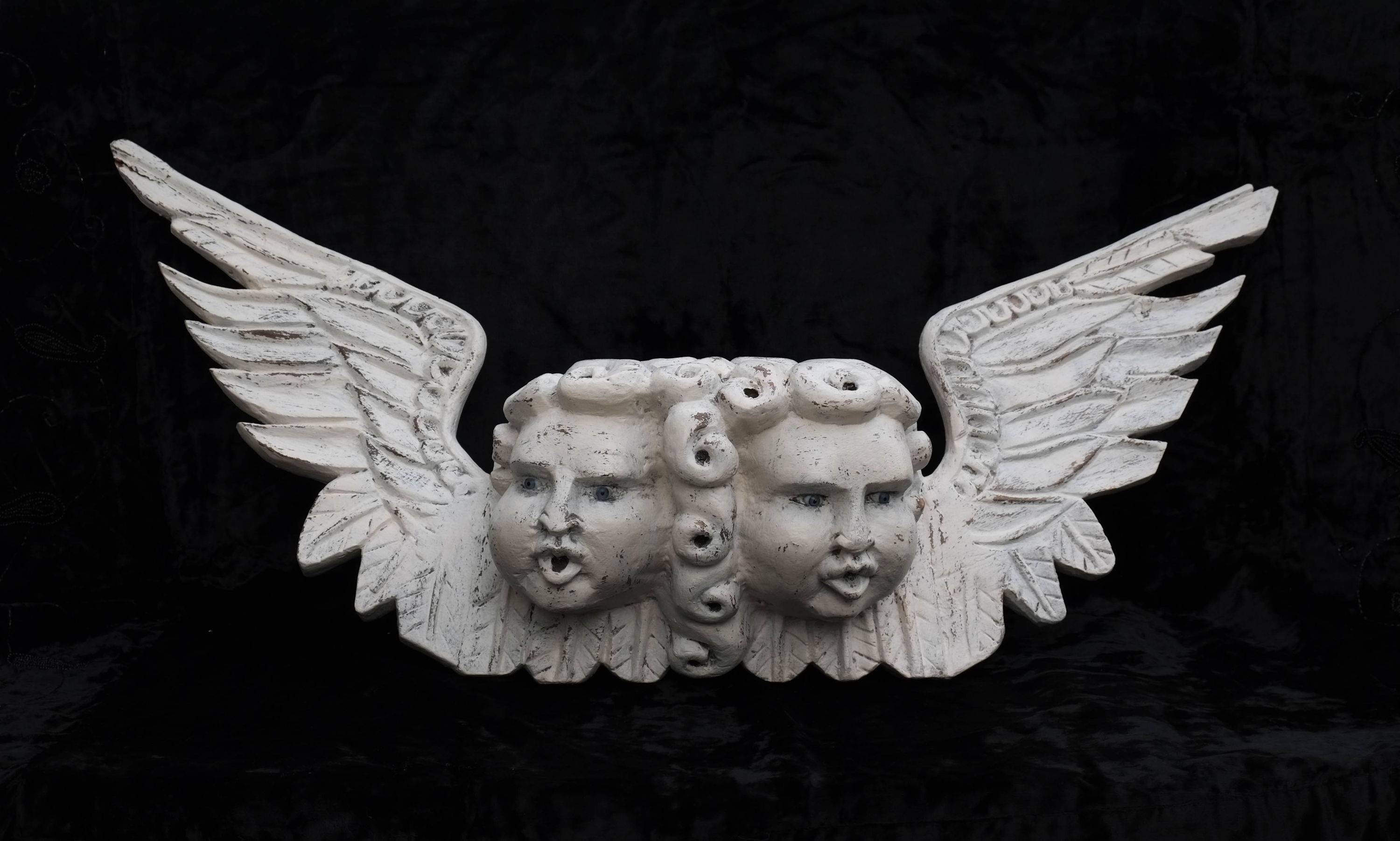 Vends trumeau tête d’angelots