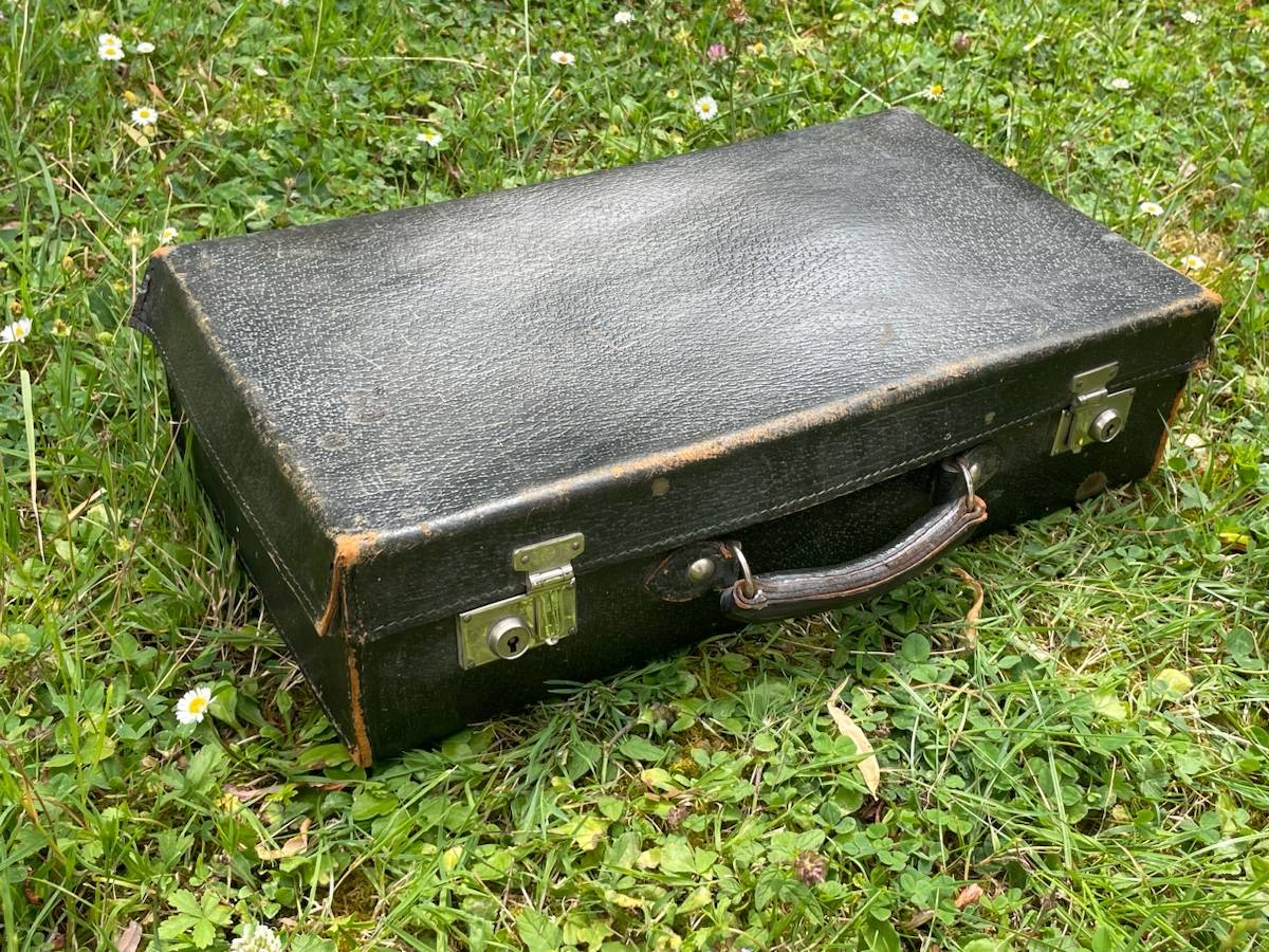Vends valise vintage cuir noir