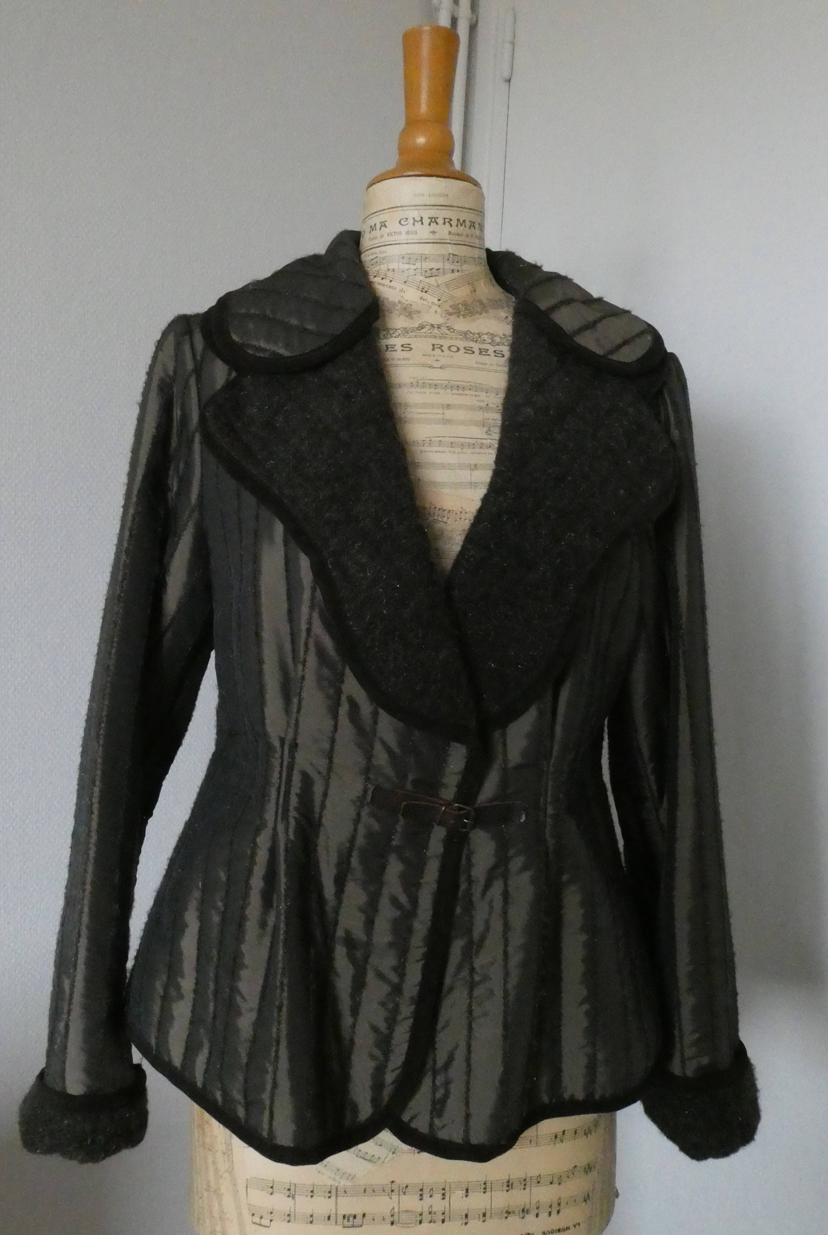 Vends veste T. 40 quasi neuve - Taille L