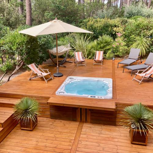 Loue Lacanau océan villa 150m² en bordure de golf ; 4 chambres 8 couchages, jacuzzi terrasses bois, jardin