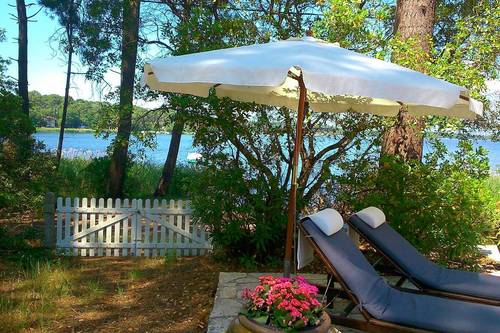 Loue maison pied dans l’eau sur le lac de Lacanau (33) - 4 chambres, 9 couchages